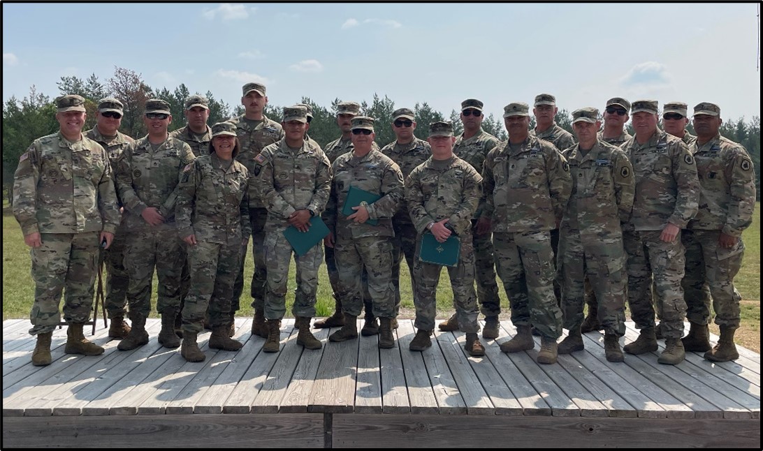 A group of soldiers posing for a photoDescription automatically generated with medium confidence A group of soldiers posing for a photoDescription automatically generated with medium confidence